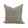 Decorative pillow with geometric pattern on a white background