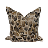Leopard print pillow on a white background