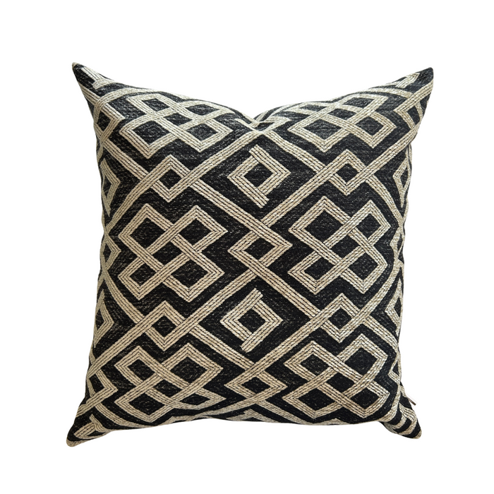Decorative pillow with a geometric pattern on a white background