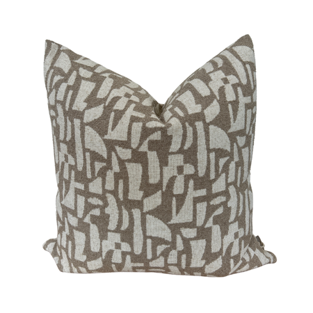 Decorative pillow with abstract pattern on a white background
