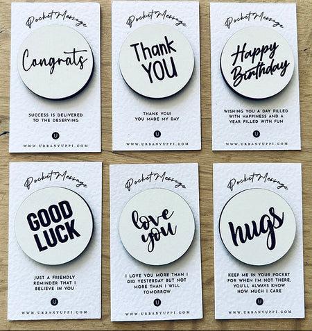 Six white pocket message gift cards displaying circular tokens with handwritten-style expressions including congrats, thank you, and happy birthday.