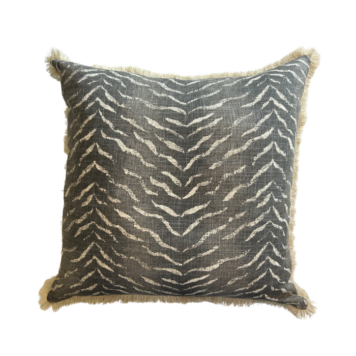 Decorative pillow with a zebra pattern on a white background